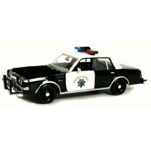    Motormax 1/24 CHP 1986 Dodge Diplomat Police Car Toys & Games