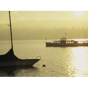  Boats Silhouetted Against the Sun on Lake Zurich Stretched 