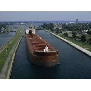  Ore Freighter Ship Exits the Soo Locks on the St. Marys 