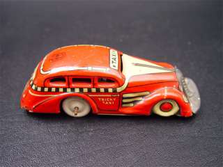 Marx Red Tricky Taxi Tin Windup Toy Table Top Car  