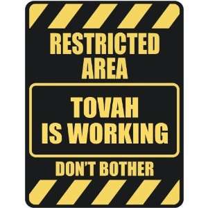   RESTRICTED AREA TOVAH IS WORKING  PARKING SIGN