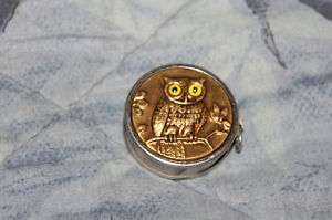 BRASS TAPE MEASURE, RELIEF OWL WITH GLASS EYES  