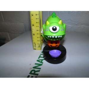  one eyed green monster candy dispenser 