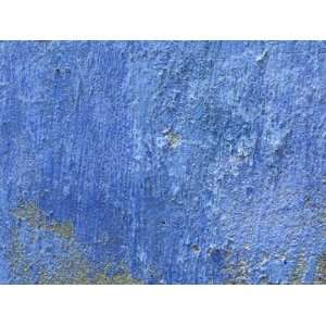  Close up of Blue Paint Chipping from Stone Wall 