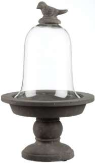 This glass cloche has a bird knob and comes with a stone finish 