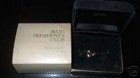 Avon Presidents Club Pin gold ribbon with 1 ruby  