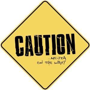   CAUTION  MEJIA ON THE WAY  CROSSING SIGN