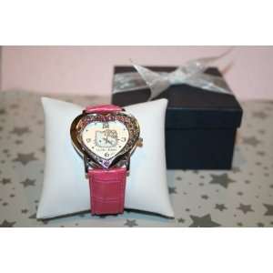 Hello Kitty Heart Shaped Quartz Wrist Watch in Hot Pink. Comes in Dark 