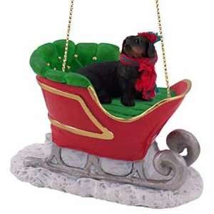  Doxie in a Sleigh Christmas Ornament