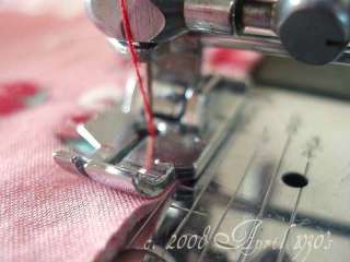 The little steel bar aligns to your seam and guides your stitching 