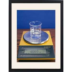  Water in beaker on scales Framed Prints