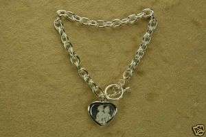 STERLING SILVER BRACELET WITH SMALL HEART CHARM PICTURE  