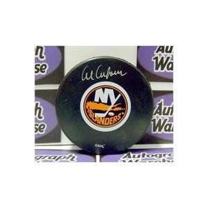   Arbour autographed New York Islanders Hockey Puck