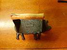 vintage cast iron pig bacon press with wooden handle very detailed 