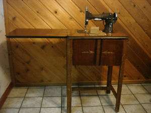 VINTAGE NATIONAL SEWING MACHINE W/ATTACHMENTS & CABINET  
