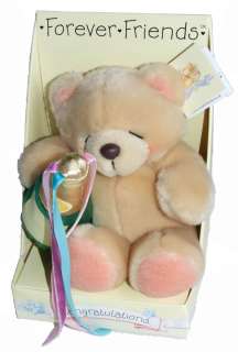 Absolutely gorgeous soft plush bear holding a bottle of champagne.