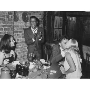  Actors Sammy Davis Jr. and Richard Burton and May Britt 