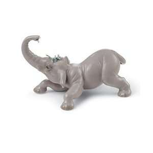  Lladro Porcelain Figurine Baby Elephant with Blue Flower 